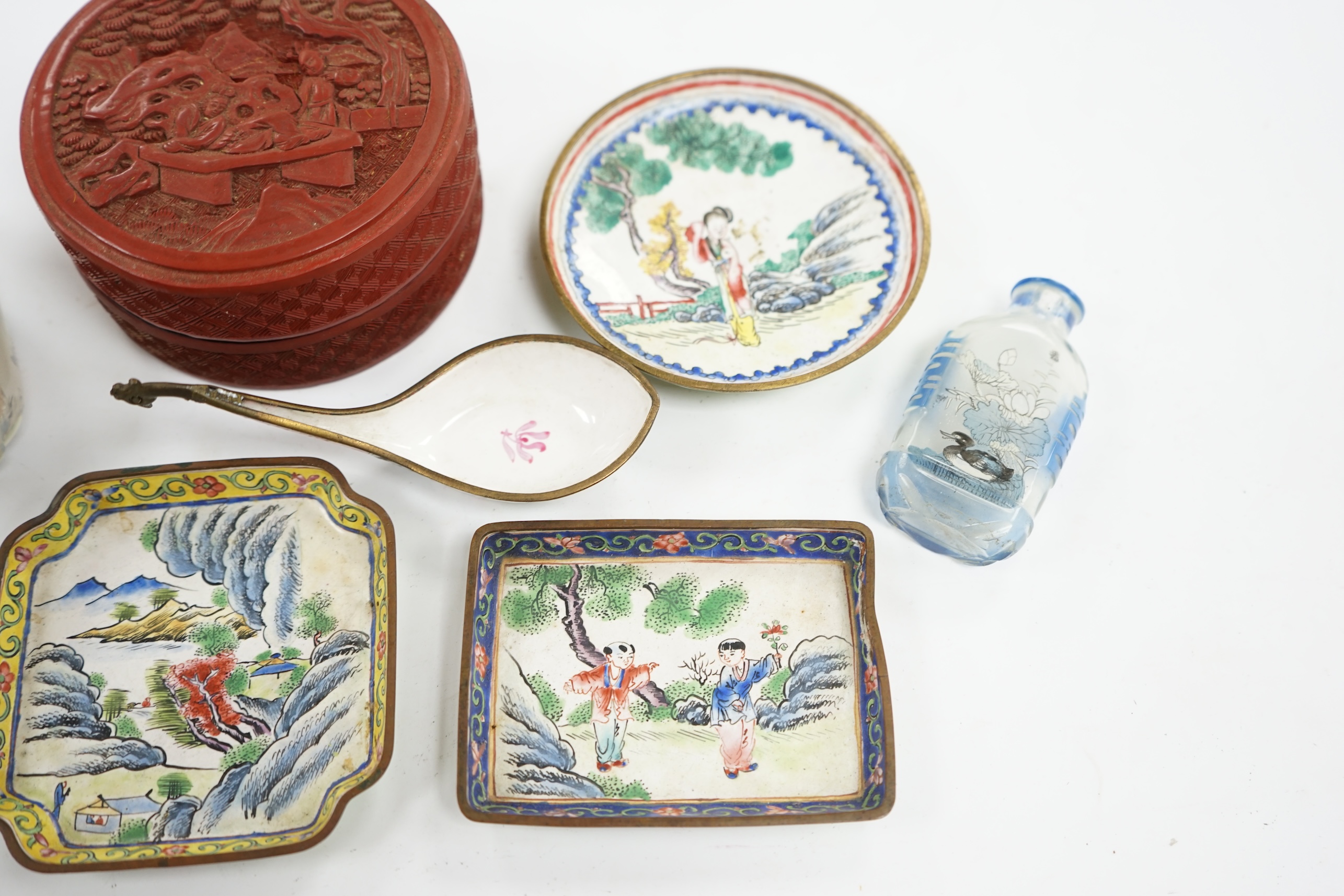 A group of Chinese Canton enamel trays, a Chinese lacquer box and cover, snuff bottles, two filigree work boxes, and a champlevé enamel box and cover, largest 10cm in diameter. Condition - varies